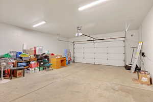 Garage featuring a garage door opener