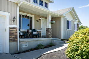 Entrance to property featuring a porch