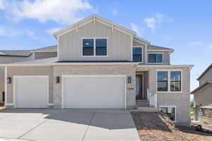 View of front of home featuring a garage