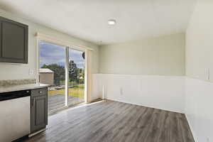 Unfurnished dining area with hardwood / wood-style floors