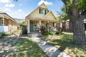 Bungalow featuring a porch.