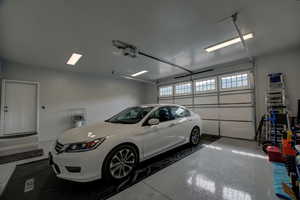 Garage featuring an epoxy floor