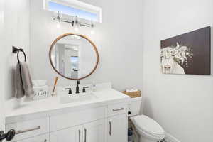 Bathroom with vanity and toilet