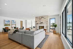 Living room featuring light hardwood / wood-style floors and a fireplace