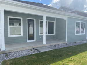 Extended covered patio with lighting and electrical plugs great for BBQ and outdoor living