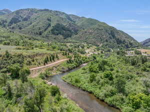 Mountain view featuring a water view