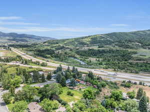 Aerial view featuring a mountain view