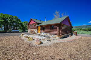 View of front of home featuring a patio