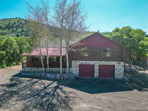 View of front of property with a garage