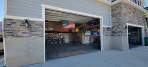 View of patio / terrace with a garage