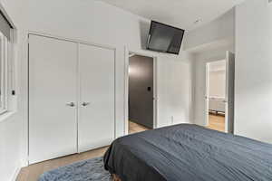 Bedroom with closet and ceiling fan