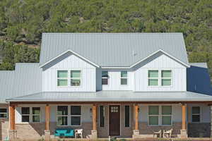 View of front facade featuring a porch