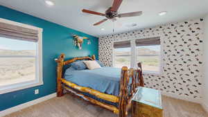 Bedroom with carpet floors and ceiling fan