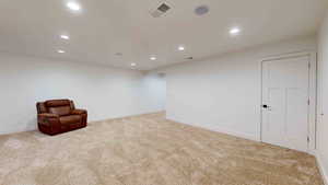 Unfurnished room with carpet floors