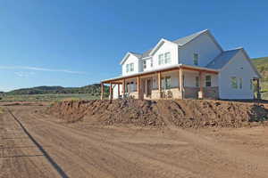 View of front of property featuring a porch