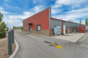 View of property featuring central AC unit