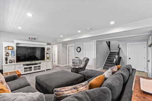 Living room with wood-type flooring