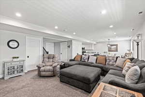 Living room featuring carpet floors