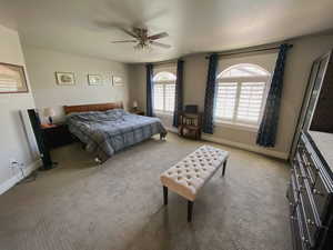 Bedroom with carpet floors and ceiling fan