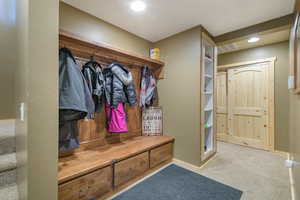 Mudroom with carpet