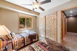 Bedroom featuring carpet flooring and ceiling fan