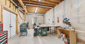 Basement featuring a workshop area