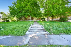 View of front of property with a front lawn