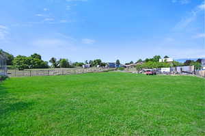 View of yard with a rural view