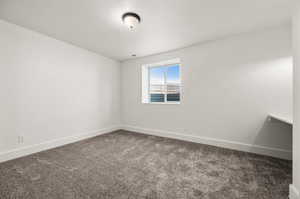 View of carpeted spare room