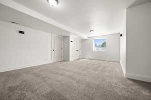 Spare room with carpet flooring