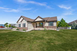 View of front of property featuring a front lawn