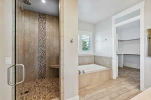 Master Bathroom Shower, Tub, & Laundry in Closet