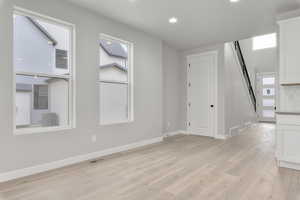 Empty room featuring light hardwood / wood-style floors