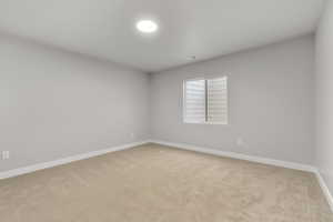 Spare room with light carpet