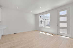 Interior space with light hardwood / wood-style floors