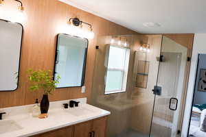 Bathroom with walk in shower and double vanity