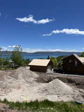 Lot. Water view with a mountain view