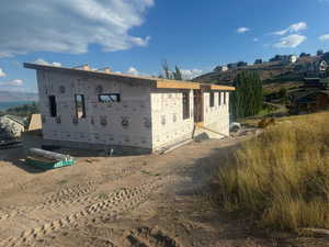 Exterior space featuring a mountain view