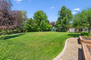 View of yard featuring a playground