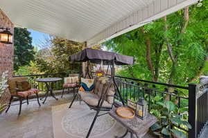 View of patio / terrace with a balcony