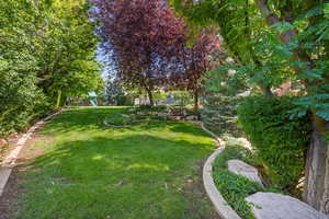 View of yard featuring a playground