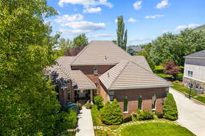 View of front of home featuring central AC unit