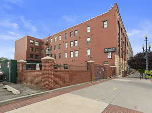 Gated parking east side of building