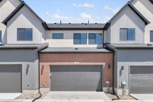 View of garage of property featuring a garage