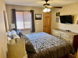 Bedroom featuring ceiling fan