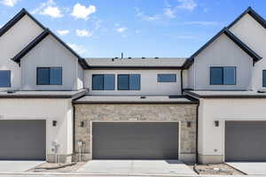 Modern farmhouse featuring a garage