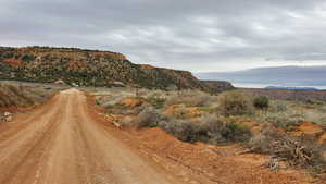 Wide dirt road on east side of property going south. Apple Valley Road (1400 N)