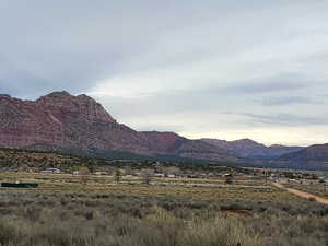 Looking north toward Zion from the back of the property. 1400 N on right and pumphouse on left.