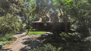 View of yard with covered porch