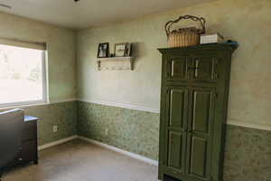 Unfurnished bedroom featuring carpet